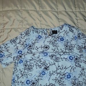 Laura Scott light blue floral set with a blouse and skirt